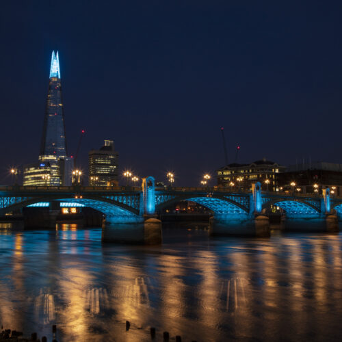 London, Cannon Street and Southwark bridges illuminated in NHS blue to show support for Covid-19 frontline workers